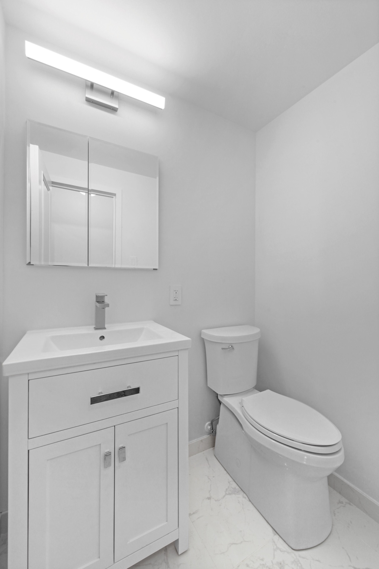 Custom bathroom with stone walls and freestanding tub